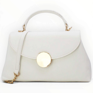 SUL EXTRAS Tom & Eva white structured handbag with gold-tone circular accent, top handle, and shoulder strap.
