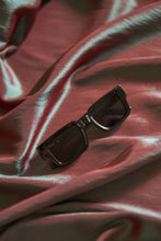 Load image into Gallery viewer, Unisex Sefsan Evolution sunglasses featuring durable black frame, UV-protected light transparent black lens, and contemporary design for men and women model photography view 
