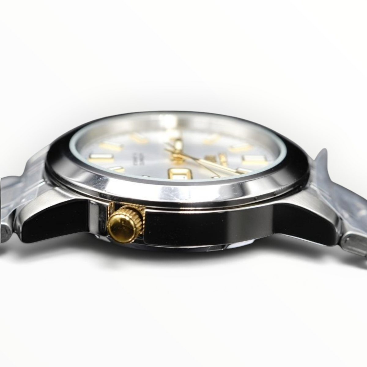 SUL EXTRAS silver and gold tone stainless steel analog watch with a white dial and side crown detail