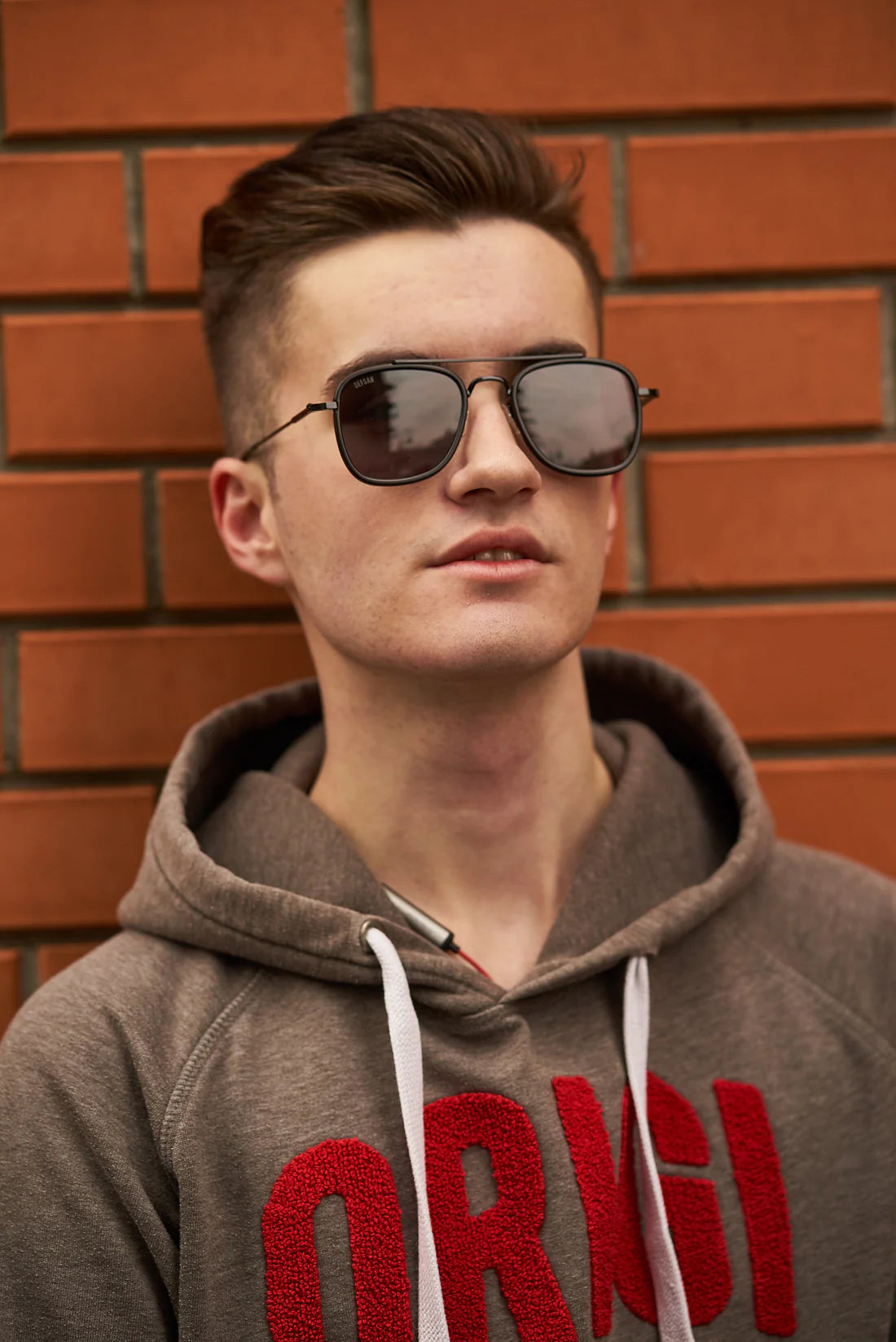 Unisex Sefsan Pukka alloy sunglasses featuring durable metal frame, UV-protected smoke lenses, and classic timeless design model view 