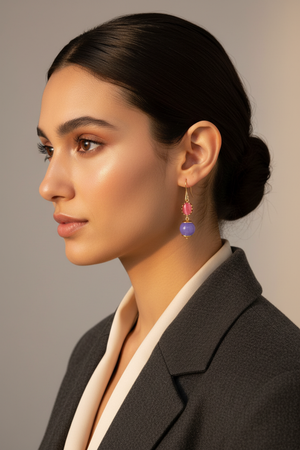 Purple and pink drop earrings on model - tiny stones