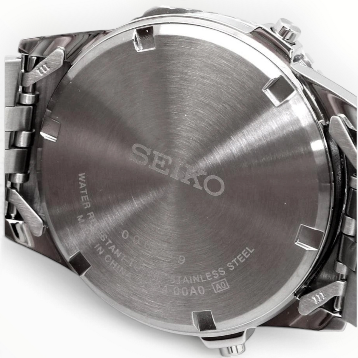 SUL EXTRAS Seiko Rotocall digital watch stainless steel screw-in case back with engraved branding and specifications.