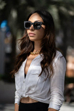 تحميل الصورة إلى عارض المعرض، Sefsan Crimpy unisex sunglasses with dolphin grey full-rim frame, smoke mirrored lenses, modern square design, and everyday casual style model side view 
