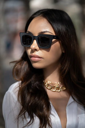 Sefsan Crimpy dolphin grey smoke sunglasses with durable frame, UV-protected lenses, unisex contemporary design, and comfortable fit model side view 
