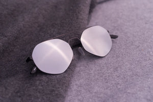 Sefsan black/silver sunglasses with matte metal frame, smoke tinted lenses, unisex design, and comfortable fit, front view 