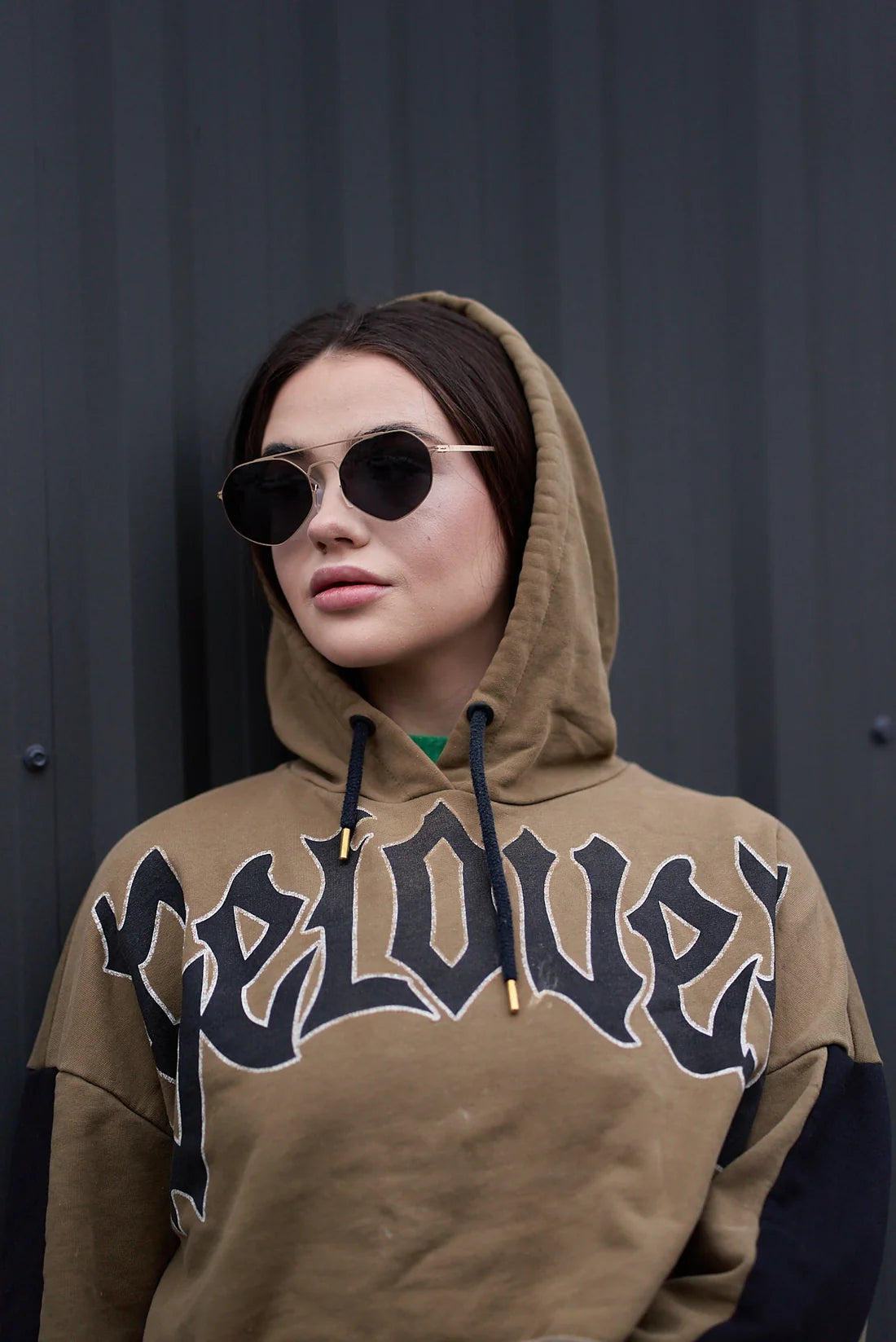 Unisex Sefsan gold frame sunglasses with smoke tinted lenses, sleek contemporary design, and UV-protected lenses for outdoor wear model front view 