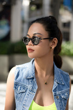 Load image into Gallery viewer, Sefsan Sphaira sunglasses with transparent transparent black frame and smoke lenses, unisex modern design, lightweight and stylish for everyday wear
