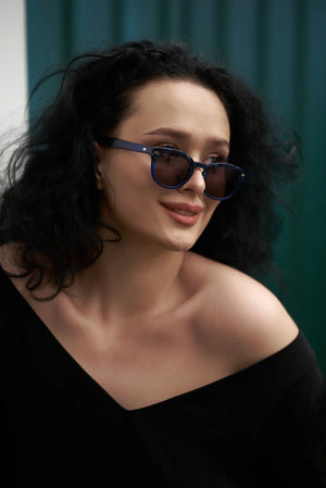 Trendy Sefsan Yang eyewear featuring bold acetate frame, anti-reflective CR39 lenses, classic square semi-circle style, and lightweight design front view women/unisex