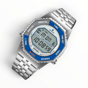 SUL EXTRAS Seiko Rotocall digital watch with a blue and grey rotating bezel and stainless steel link bracelet.