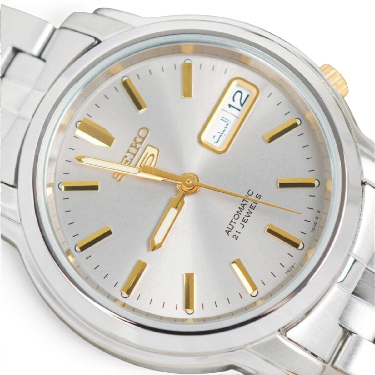 SUL EXTRAS Seiko 5 automatic watch featuring a grey dial, gold-tone hands, and silver-tone stainless steel bracelet.