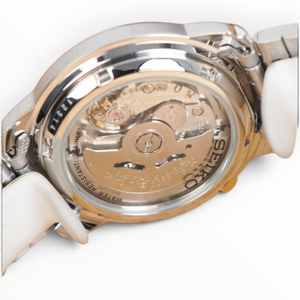 SUL EXTRAS Seiko 5 automatic watch showing the detailed mechanical movement through the transparent exhibition case back