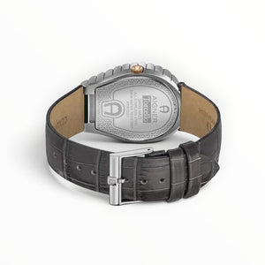 SUL EXTRAS Aigner Torcello watch caseback showing engraved logo and details with a dark grey crocodile leather strap