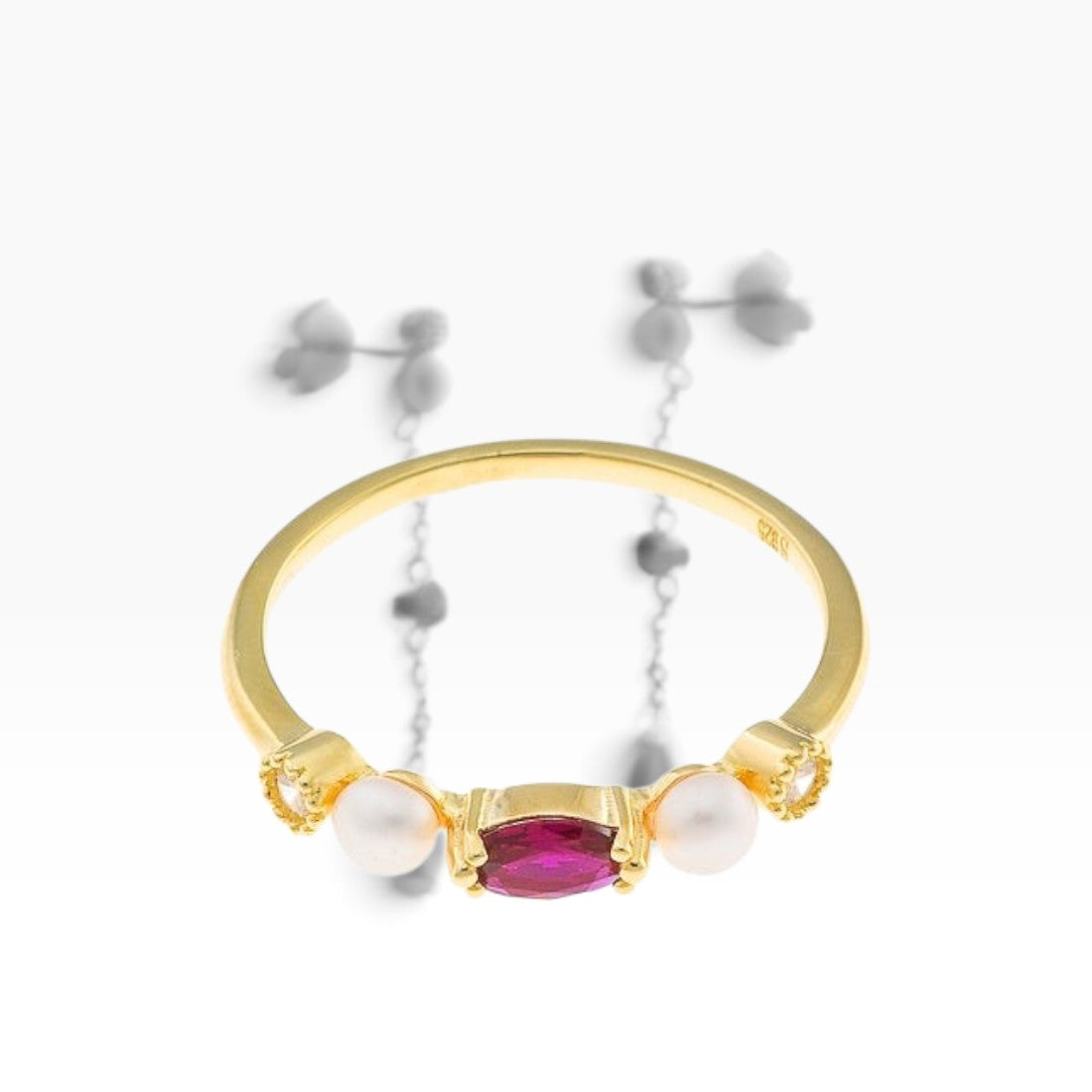 SUL EXTRAS gold plated sterling silver ring featuring a central red zirconia stone flanked by two white pearls
