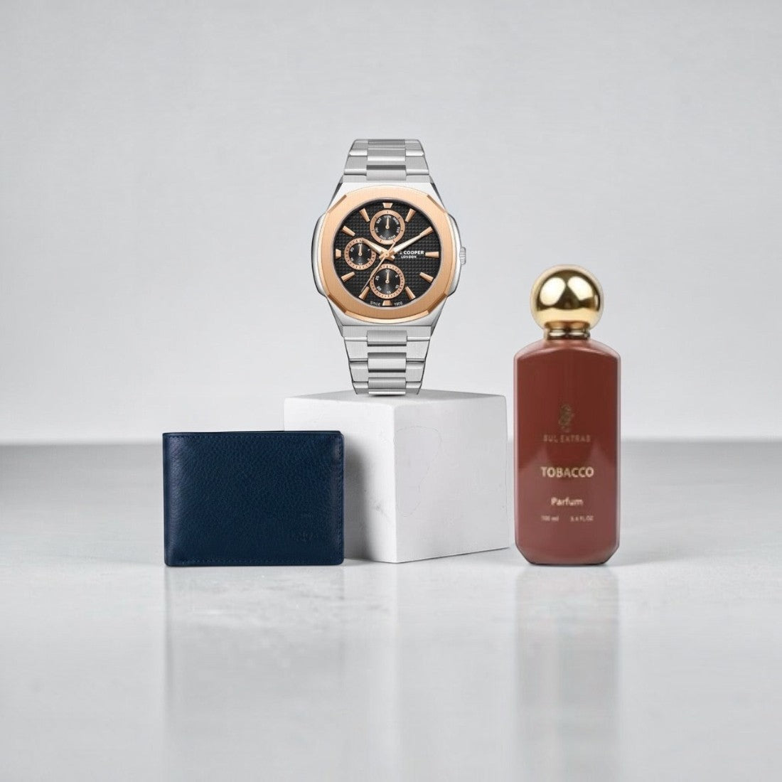 SUL EXTRAS Heritage Prime Trio set featuring a Lee Cooper watch, navy leather wallet, and Tobacco perfume bottle.