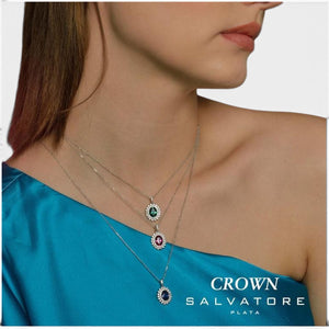 SUL EXTRAS jewelry set featuring three layered silver necklaces with oval green, pink, and blue halo pendants.