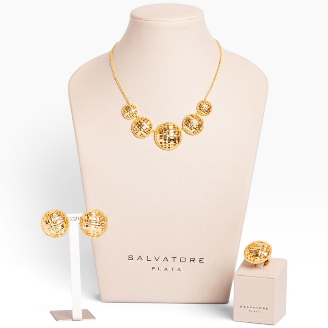 SUL EXTRAS Madras gold-plated stainless steel necklace, earrings, and ring set with intricate woven circular designs.