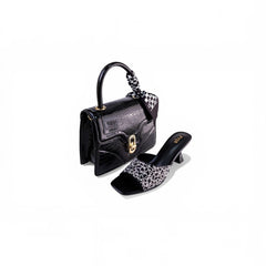 SUL EXTRAS Midnight Set featuring a black crocodile-embossed top-handle bag and crystal-embellished kitten heel sandals