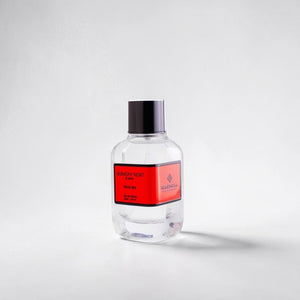 SUL EXTRAS Harmony Night Eau de Parfum by Qarnoza in a clear glass bottle with a red label and black cap