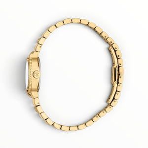SUL EXTRAS Roberto Cavalli Lady gold watch with herringbone feather bezel and bracelet, side profile view.