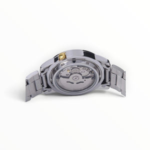 SUL EXTRAS Seiko 5 automatic watch exhibition caseback showing the 7S26 movement and stainless steel bracelet