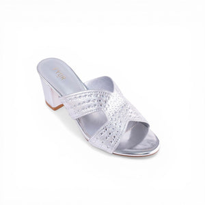 SUL EXTRAS silver FYOR block heels featuring crystal-embellished straps for a glamorous formal look.