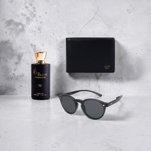 SUL EXTRAS Sovereign Trio bundle featuring Ayat For perfume, Golden Frog black leather wallet, and polarized sunglasses.
