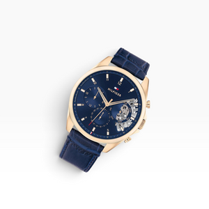 SUL EXTRAS Tommy Hilfiger men's watch with navy blue dial, rose gold case, and crocodile-embossed leather strap.