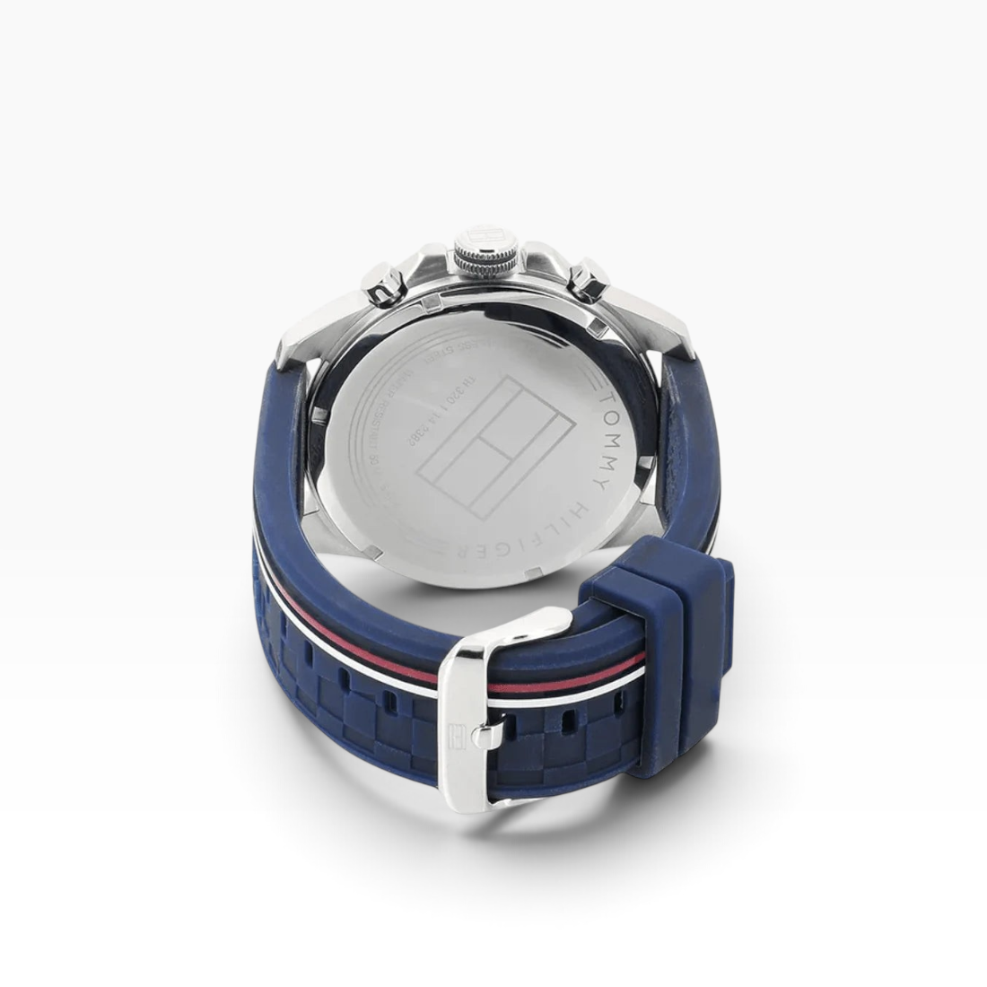 SUL EXTRAS Tommy Hilfiger men's watch showing the stainless steel caseback, navy silicone strap, and silver buckle.