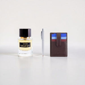 SUL EXTRAS Velvet Trio bundle featuring a perfume bottle, silver Titan steel pen, and brown leather Dudu card holder.