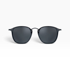 SUL EXTRAS Visi sunglasses featuring a shiny black rectangle frame with green lenses and metal stud accents.