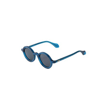 Load image into Gallery viewer, Unisex Sefsan Sphaira sunglasses featuring transparent blue full-rim frame, smoke-tinted lenses, and contemporary casual style side view 
